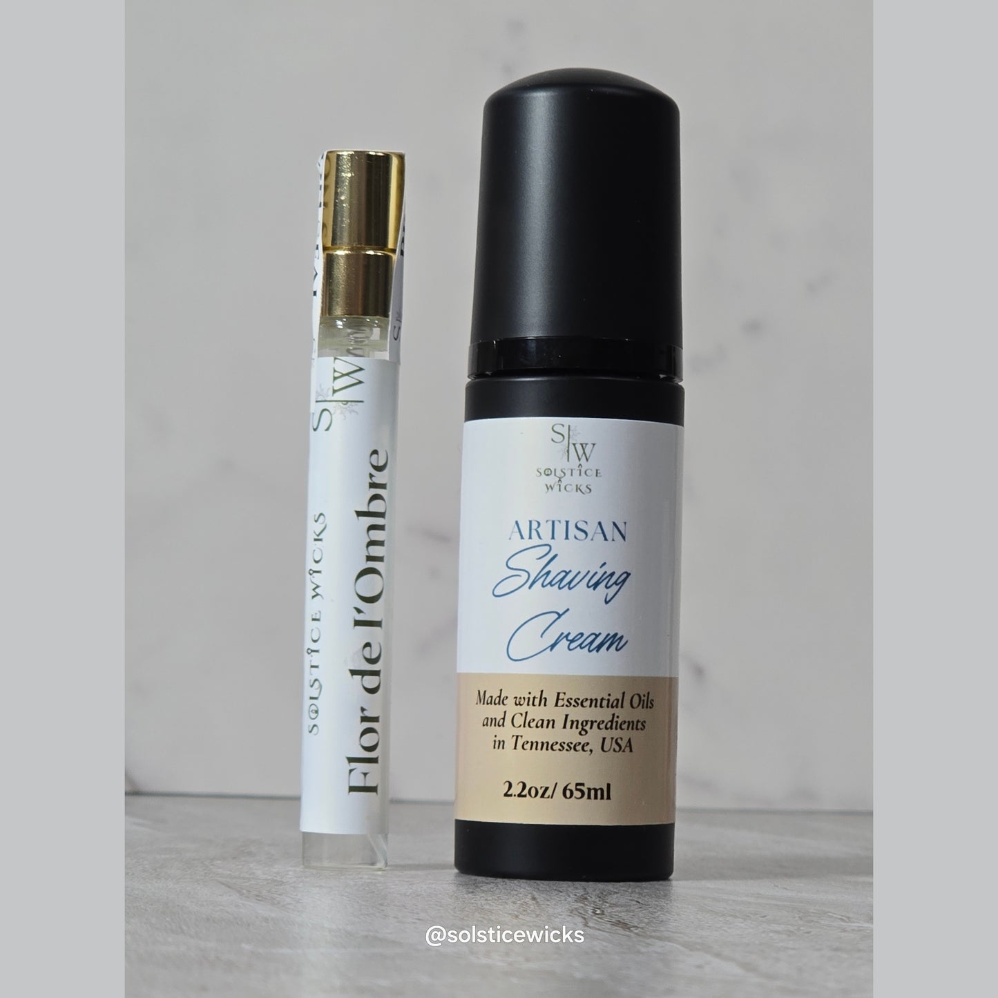 Product name fleur de i'ombre To-go parfum clear bottle with a shaving cream black bottle 