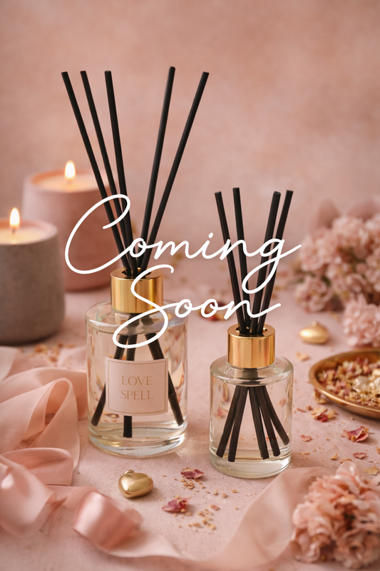 Solstice Wicks Valentine’s reed diffusers in clear glass bottles with pink background – long-lasting flameless scent