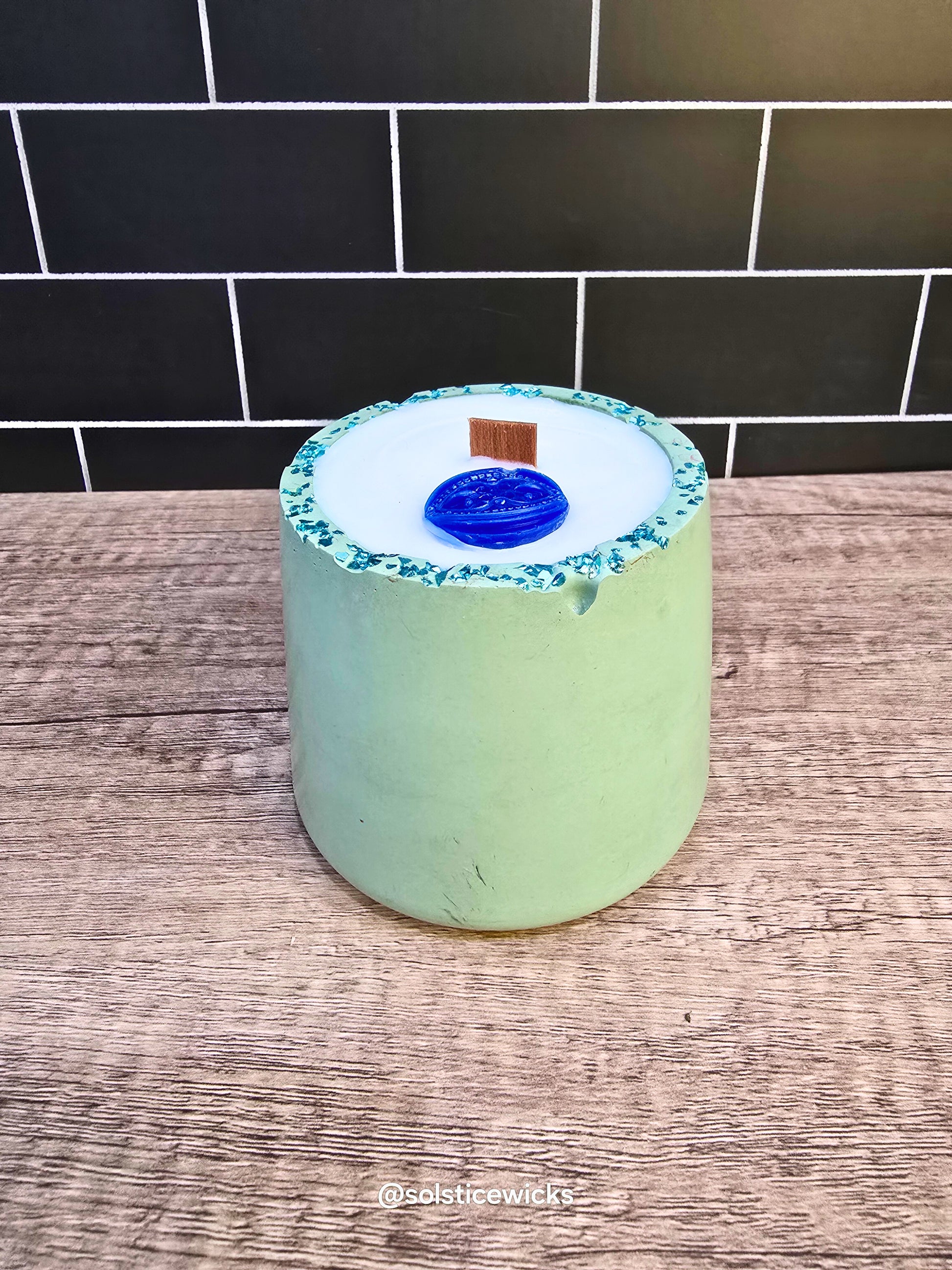 Earthbound Calm Candle in concrete jar – mint, citrus, and herbal notes for a calming, fresh home scent